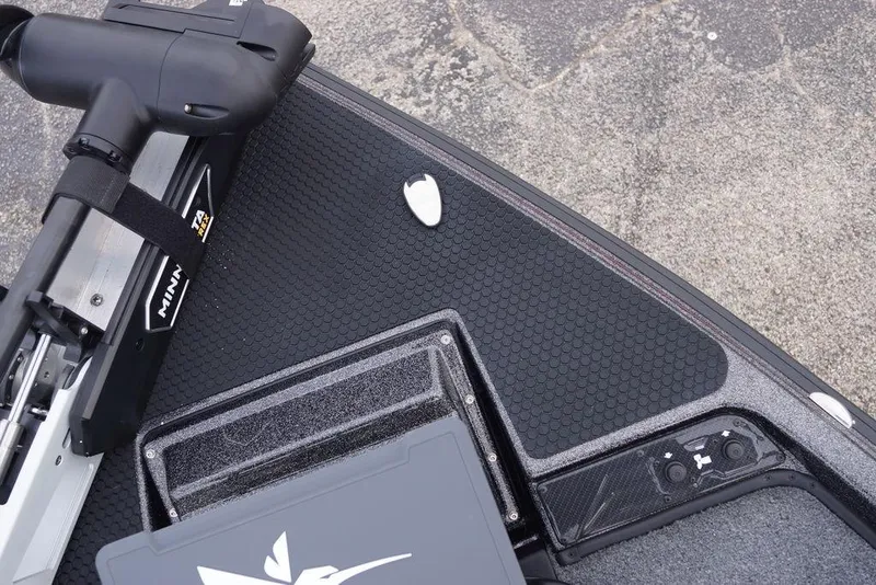 Slide: The Image of 2026 Phoenix 721 ZXL boat deck with Minn Kota trolling motor and control panel. - 23