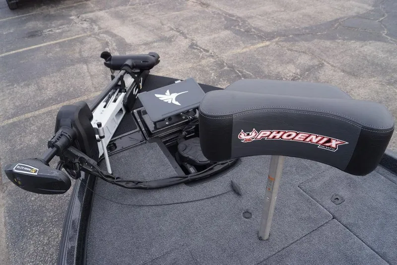 Slide: The Image of 2026 Phoenix 721 ZXL boat deck with trolling motor and branded seat. - 24