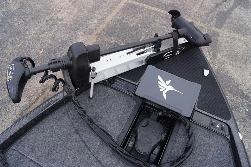 Slide: The Image of 2026 Phoenix 721 ZXL boat deck with Minn Kota trolling motor and control panel. - 29