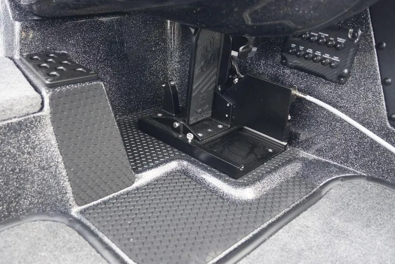 Slide: The Image of Interior view of 2026 Phoenix 721 ZXL boat foot pedal and control panel. - 31