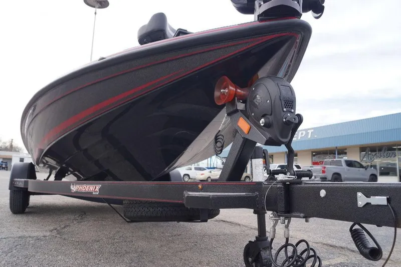 Slide: The Image of 2026 Phoenix 721 ZXL boat on trailer, showcasing sleek design and modern features. - 5