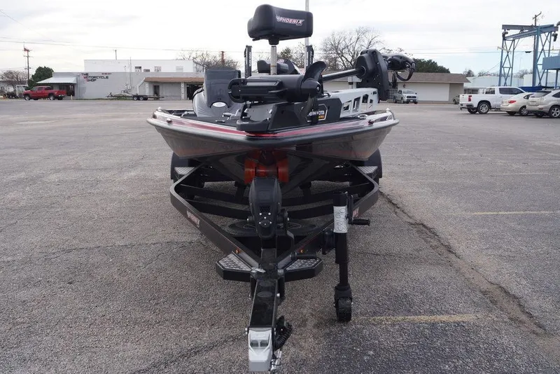 Slide: The Image of 2026 Phoenix 721 ZXL boat on trailer in parking lot. - 6