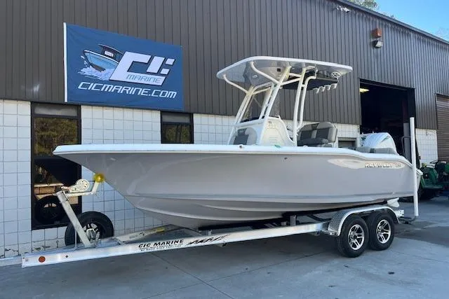 The Image of 2026 Key West 219 FS boat on trailer outside CIC Marine building. - 0