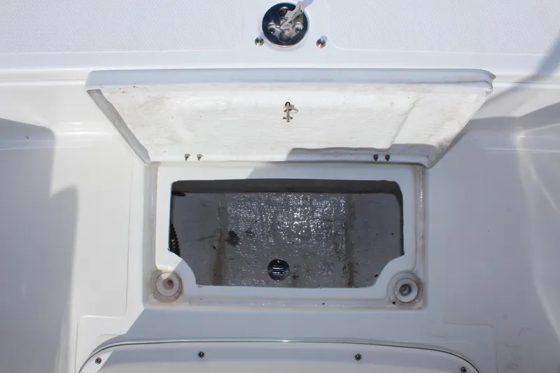 Slide: The Image of Open storage compartment on 2024 Clear Water 2000 CC boat. - 17
