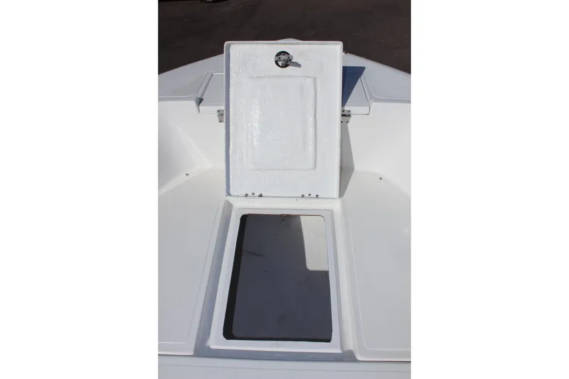 Slide: The Image of Open storage compartment on 2024 Clear Water 2000 CC boat deck. - 19