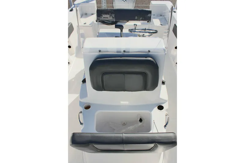 Slide: The Image of 2024 Clear Water 2000 CC boat interior with seating and steering console. - 22