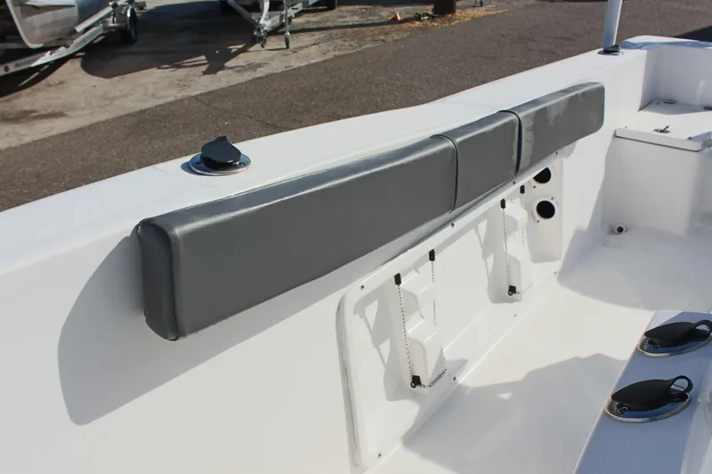 Slide: The Image of 2024 Clear Water 2000 CC boat interior with cushioned seating and storage compartments. - 23