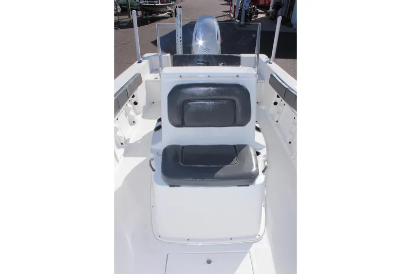 Slide: The Image of 2024 Clear Water 2000 CC boat interior with dual seating and console. - 21