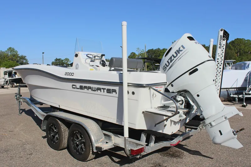 Slide: The Image of 2024 Clear Water 2000 CC boat with Suzuki engine on a trailer. - 8