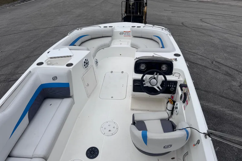 Slide: The Image of 2018 Hurricane SunDeck Sport 188 OB boat interior with seating and steering console. - 11