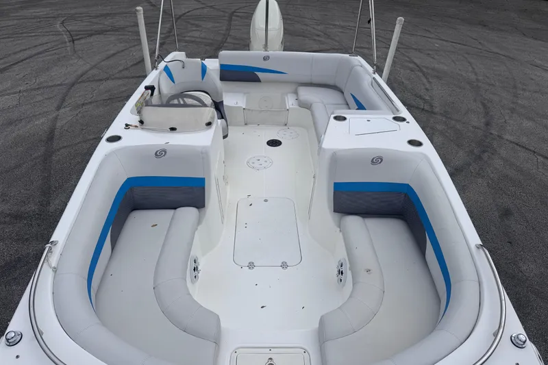 Slide: The Image of 2018 Hurricane SunDeck Sport 188 OB boat interior with spacious seating and steering console. - 9
