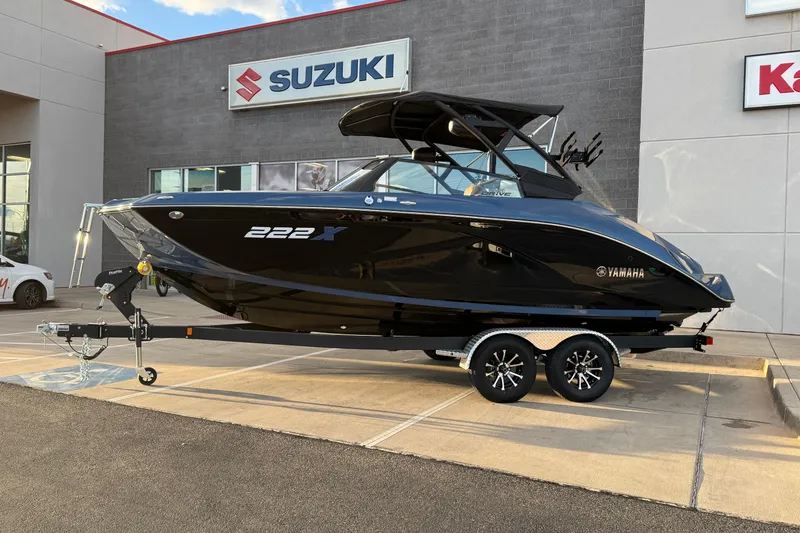 Slide: The Image of 2026 Yamaha Boats 222XD on trailer, sleek design, outdoor setting. - 5