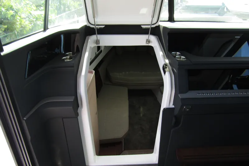 Slide: The Image of 2024 Axopar 45 XC Cross Cabin BRABUS Trim interior cabin entrance. - 21
