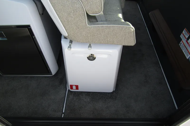 Slide: The Image of Interior of 2024 Axopar 45 XC Cross Cabin BRABUS Trim, featuring seating and storage. - 36