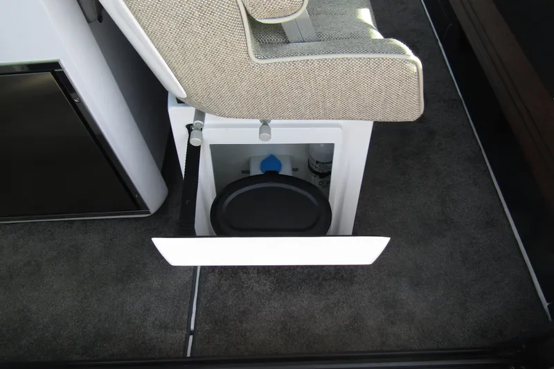 Slide: The Image of 2024 Axopar 45 XC Cross Cabin BRABUS Trim interior storage compartment. - 37