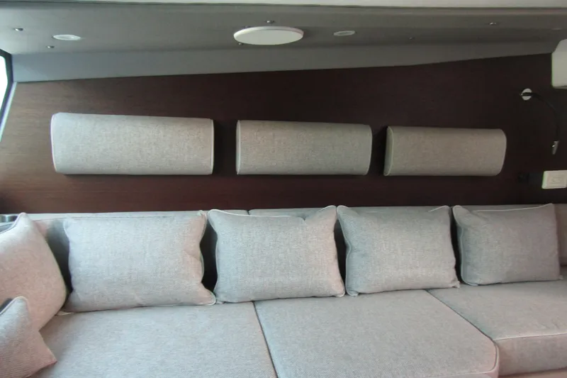 Slide: The Image of Interior of 2024 Axopar 45 XC Cross Cabin with gray cushions and modern design. - 42