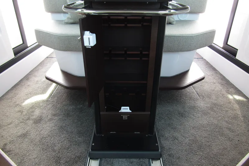 Slide: The Image of 2024 Axopar 45 XC Cross Cabin BRABUS Trim interior storage compartment. - 44