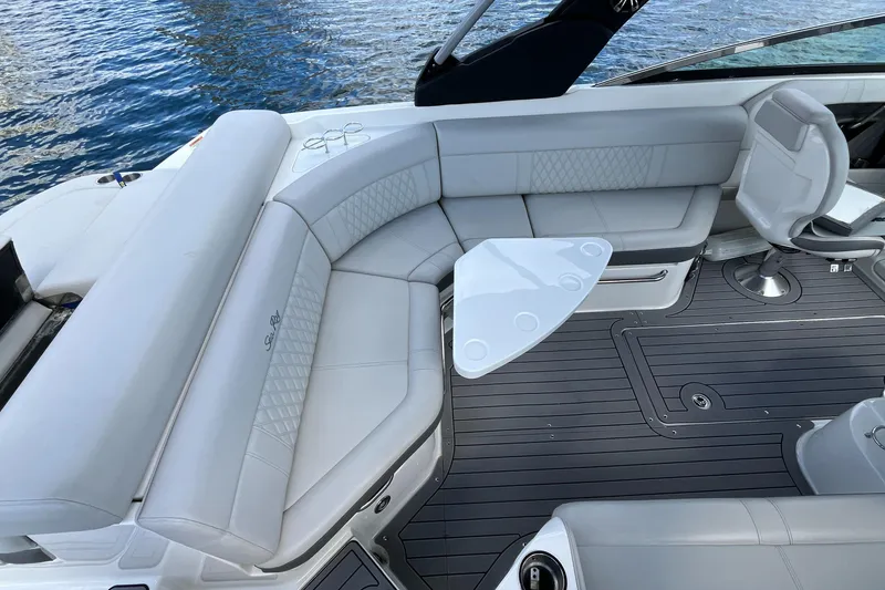 Slide: The Image of Luxurious 2021 Sea Ray SLX 280 boat interior with elegant seating and sleek design. - 24