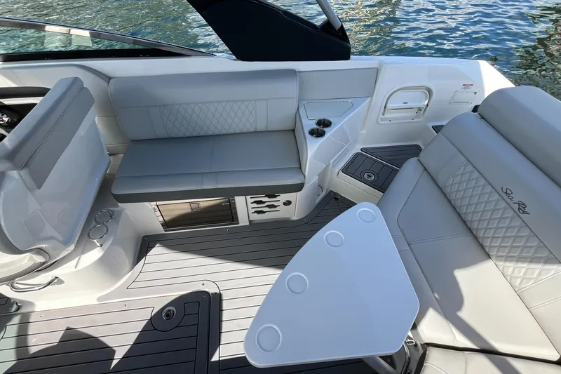 Slide: The Image of 2021 Sea Ray SLX 280 boat interior with luxurious seating and modern design. - 26