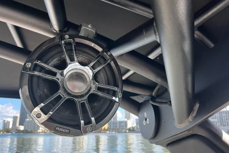 Slide: The Image of Close-up of a Fusion speaker on a 2021 Sea Ray SLX 280 boat. - 45
