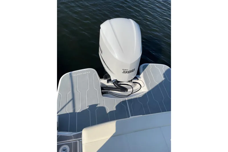 Slide: The Image of 2020 Regal 26 OBX boat with Yamaha 300 outboard motor on water. - 35