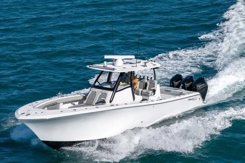 The Image of 2025 Front Runner 36 Center Console boat cruising on open water. - 0