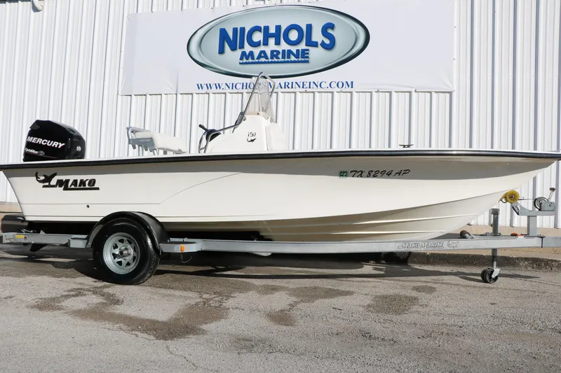 The Image of 2007 Mako 191 Inshore boat on trailer at Nichols Marine dealership. - 1
