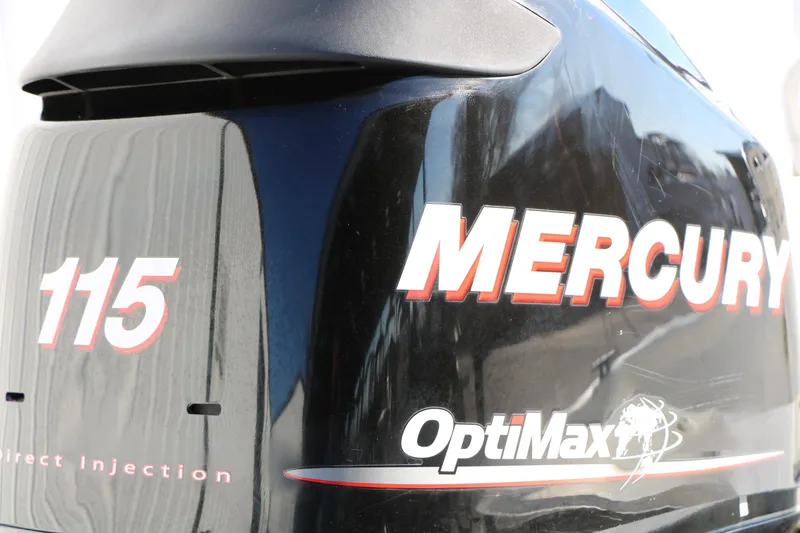 Slide: The Image of Mercury OptiMax 115 outboard engine on 2007 Mako 191 Inshore boat. - 10