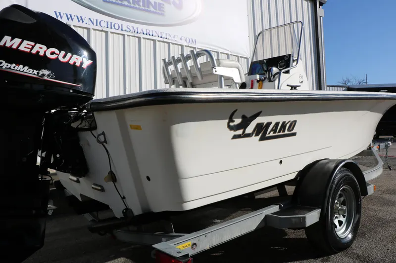 Slide: The Image of 2007 Mako 191 Inshore boat on trailer with Mercury OptiMax engine. - 11
