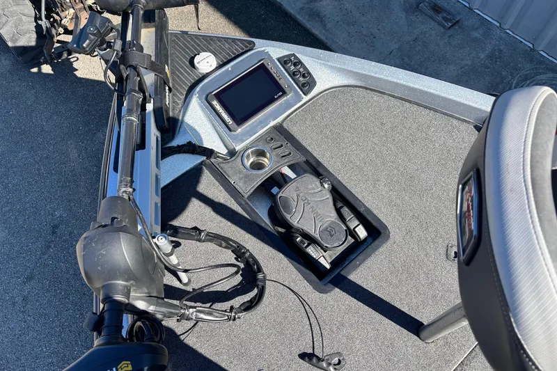 Slide: The Image of 2018 Ranger Z519 Comanche boat dashboard with navigation controls and display screen. - 3