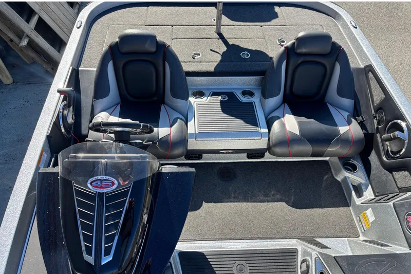 Slide: The Image of 2018 Ranger Z519 Comanche boat interior with dual seats and steering console. - 7