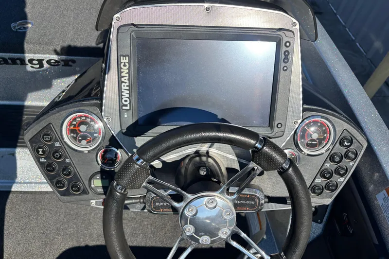 Slide: The Image of 2018 Ranger Z519 Comanche dashboard with Lowrance display and steering wheel. - 8