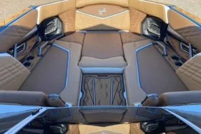 Slide: The Image of 2025 Tigé Ultré 25ZX boat interior with luxurious seating and modern design. - 7
