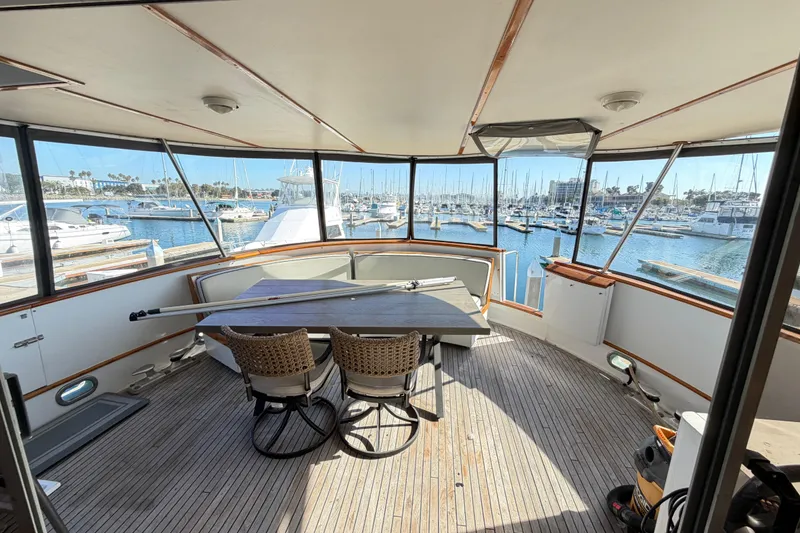 Slide: The Image of 1988 Cheoy Lee 66 Long Range MY yacht interior with marina view. - 14