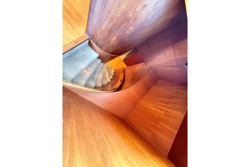 Slide: The Image of Curved wooden staircase inside 1988 Cheoy Lee 66 Long Range MY yacht. - 23