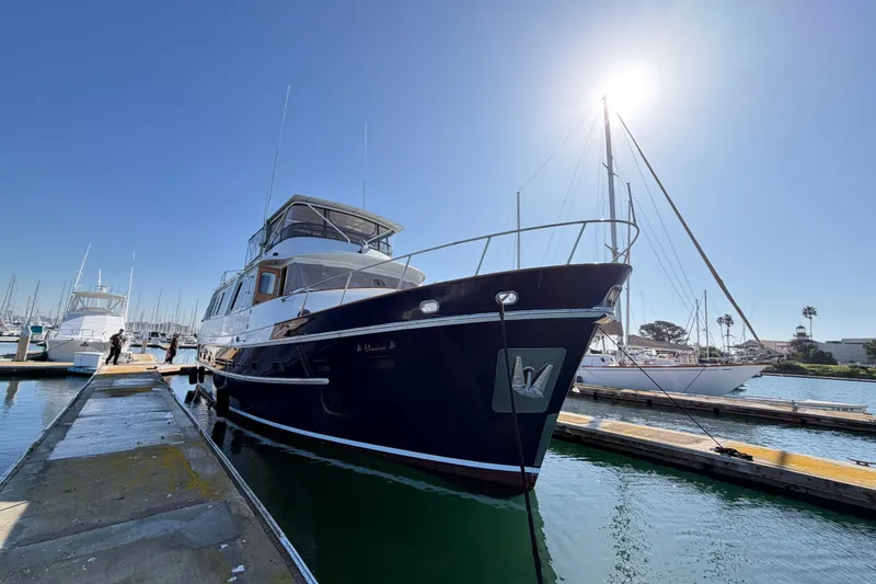 Slide: The Image of 1988 Cheoy Lee 66 Long Range MY yacht docked in sunny marina. - 3