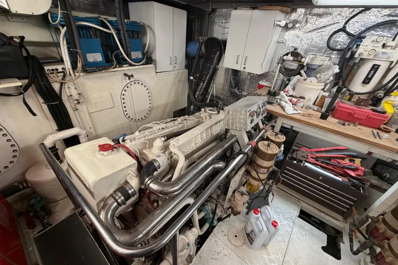 Slide: The Image of Engine room of 1988 Cheoy Lee 66 Long Range MY with tools and equipment. - 34