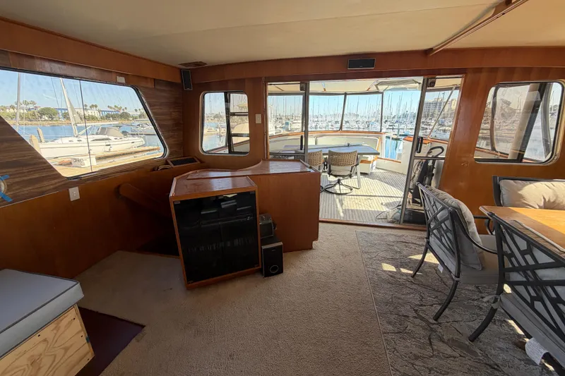 Slide: The Image of Interior of 1988 Cheoy Lee 66 Long Range MY yacht with marina view. - 38