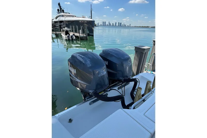 Slide: The Image of 2006 Hydra-Sports Vector 3300 CC with twin Yamaha 250 engines docked by the water. - 17