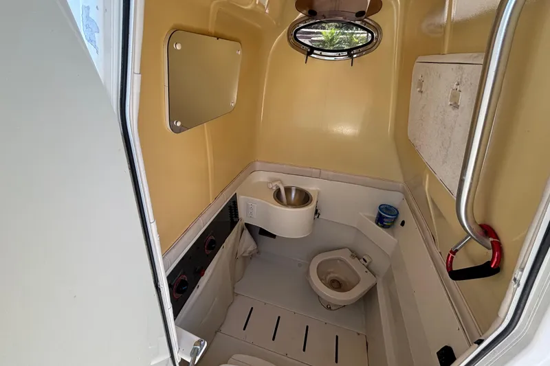 Slide: The Image of 2006 Hydra-Sports Vector 3300 CC boat bathroom with sink and toilet. - 20
