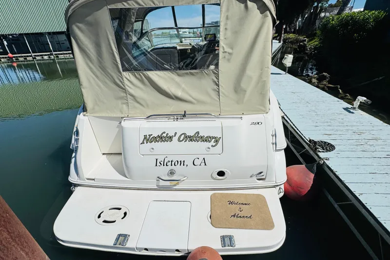Slide: The Image of Sea Ray 290 Sundancer 2000 docked, featuring "Nothin' Ordinary" nameplate, Isleton, CA. - 13