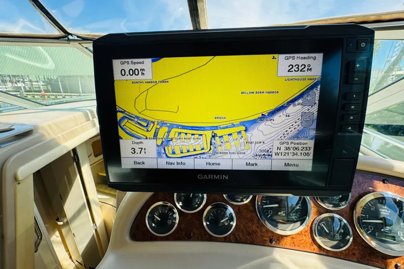 Slide: The Image of Garmin GPS display on 2000 Sea Ray 290 Sundancer, showing navigation map and coordinates. - 24