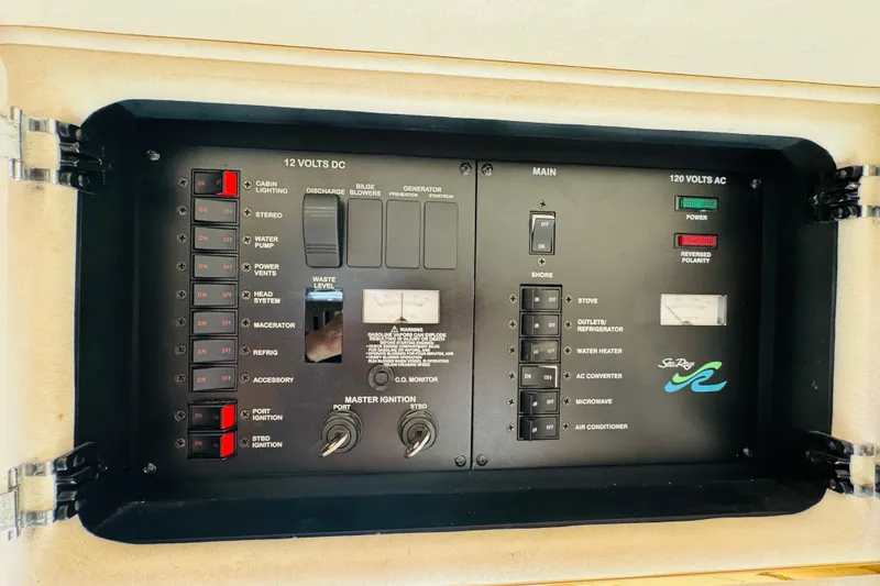 Slide: The Image of Electrical control panel of a 2000 Sea Ray 290 Sundancer boat. - 40
