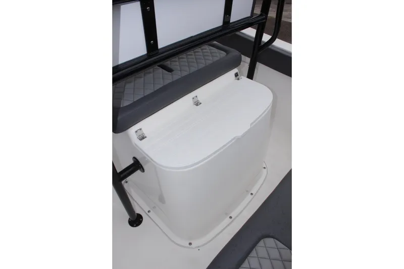 Slide: The Image of 2024 Clearwater 2300 CC boat interior with cushioned seating and storage compartment. - 19