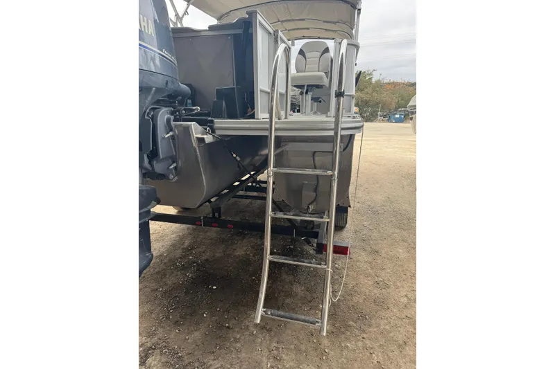 Slide: The Image of 2022 G3 Suncatcher Select 322RF pontoon boat with ladder and Yamaha engine. - 8