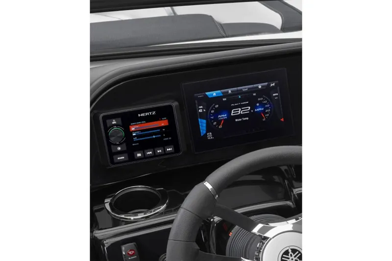 Slide: The Image of Dashboard of 2026 Yamaha Boats 195S with digital displays and steering wheel. - 23