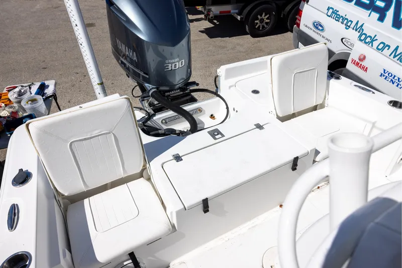 Slide: The Image of 2016 Sea Hunt BX 24 BR boat with Yamaha 300 engine, featuring white seating and deck. - 5
