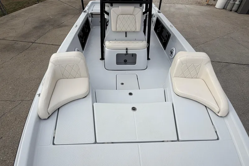 Slide: The Image of Open storage compartment on 2021 Blue Wave 2400 PureBay boat, showcasing interior design. - 22