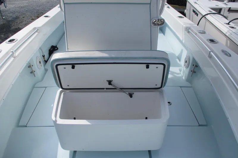 Slide: The Image of 2019 Contender 25 Tournament boat interior with open storage compartment. - 15