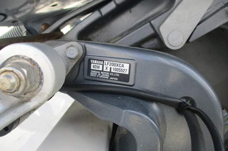 Slide: The Image of Close-up of Yamaha LF200XCA engine part on 2019 Contender 25 Tournament boat. - 21